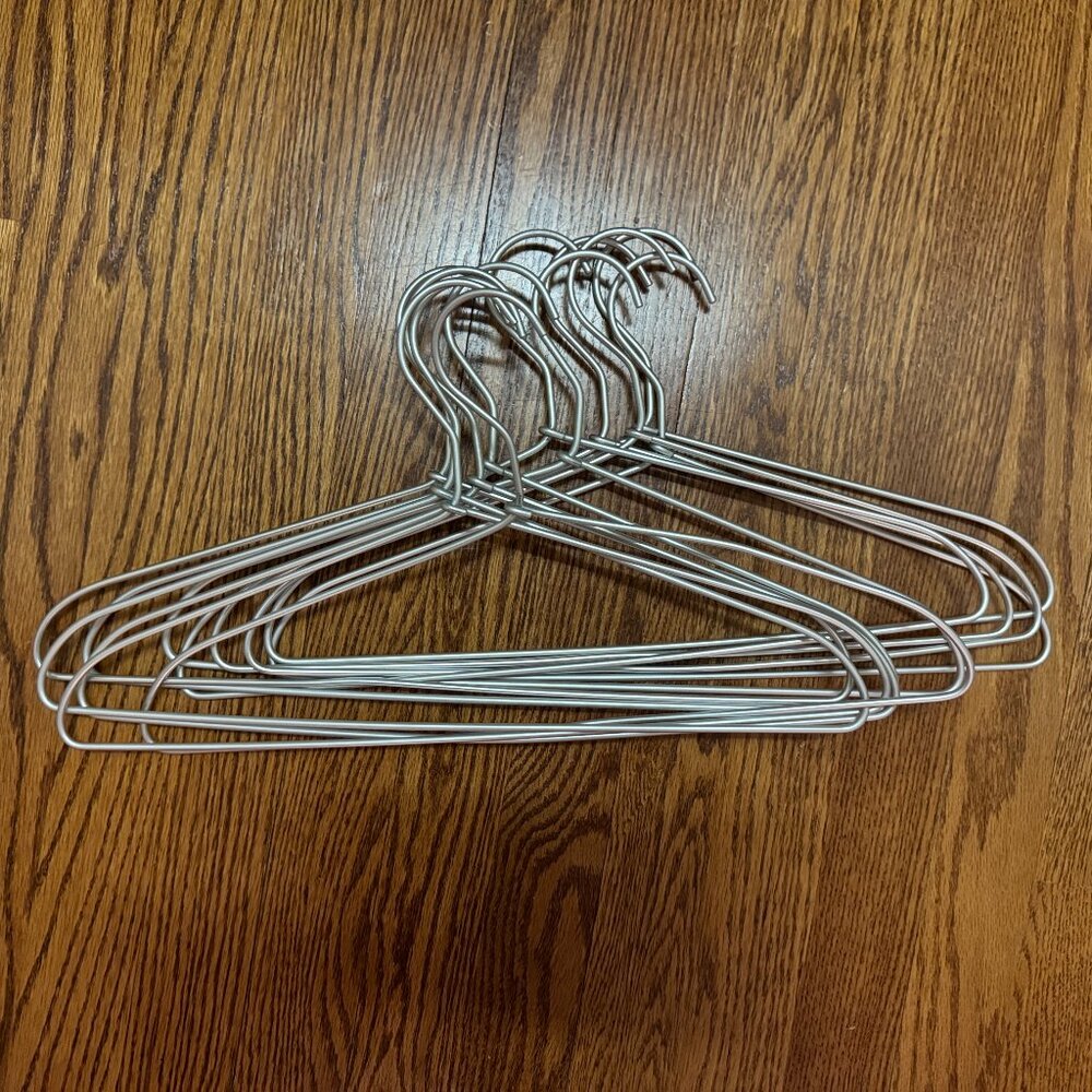 12 Muji metal hangers - possibly aluminum